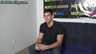 Solo handsome stud with tattoo wanks cock on casting